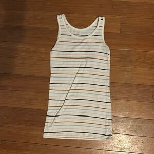 A striped tank top. One small stain on the front.